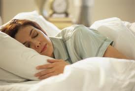 older woman sleeping on white sheets to your health nutrition
